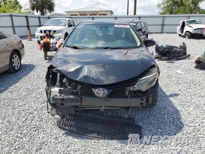 Piąte zdjęcie samochodu w środku: 2019 TOYOTA COROLLA L VIN:5YFBURHE0KP930667 - miniatura