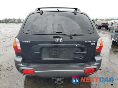 Zdjęcie 6 z 13 samochodu: 2004 HYUNDAI SANTA FE GLS VIN:KM8SC13E14U721273 - miniatura