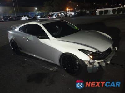 Czwarte zdjęcie samochodu z boku: 2014 INFINITI Q60 JOURNEY VIN:JN1CV6EK2EM110692 - miniatura