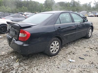 Trzecie zdjęcie samochodu z tyłu: 2002 TOYOTA CAMRY LE VIN:4T1BF32K32U026347 - miniatura