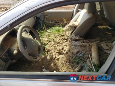 Zdjęcie 7 z 13 samochodu: 2003 NISSAN MAXIMA GLE VIN:JN1DA31A23T418511 - miniatura