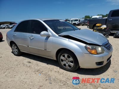Czwarte zdjęcie samochodu z boku: 2005 KIA SPECTRA EX VIN:KNAFE221895603434 - miniatura