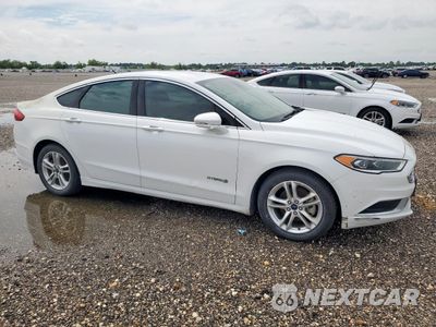 Czwarte zdjęcie samochodu z boku: 2018 FORD FUSION SE HYBRID VIN:3FA6P0LU1JR129814 - miniatura
