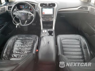 Zdjęcie 8 z 12 samochodu: 2017 FORD FUSION SE HYBRID VIN:3FA6P0LU3HR359574 - miniatura