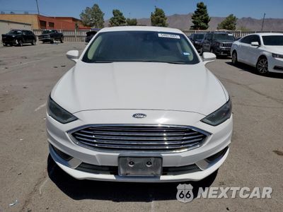 Piąte zdjęcie samochodu w środku: 2018 FORD FUSION SE HYBRID VIN:3FA6P0LU5JR129802 - miniatura