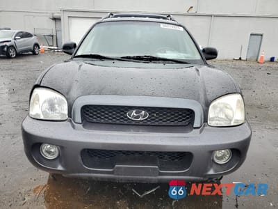 Piąte zdjęcie samochodu w środku: 2004 HYUNDAI SANTA FE GLS VIN:KM8SC13E14U721273 - miniatura