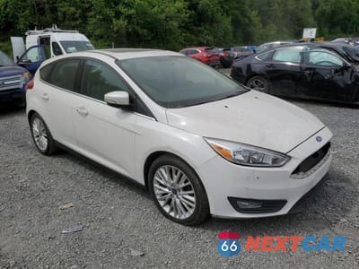 Czwarte zdjęcie samochodu z boku: 2018 FORD FOCUS TITANIUM VIN:1FADP3N23JL288255 - miniatura