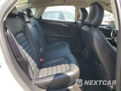 Zdjęcie 10 z 13 samochodu: 2018 FORD FUSION SE HYBRID VIN:3FA6P0LU3JR152463 - miniatura