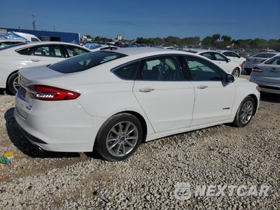 Trzecie zdjęcie samochodu z tyłu: 2017 FORD FUSION SE HYBRID VIN:3FA6P0LU3HR359574 - miniatura