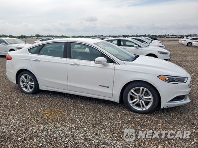 Czwarte zdjęcie samochodu z boku: 2018 FORD FUSION SE HYBRID VIN:3FA6P0LU7JR129946 - miniatura