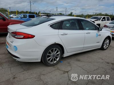 Trzecie zdjęcie samochodu z tyłu: 2017 FORD FUSION SE HYBRID VIN:3FA6P0LU2HR409591 - miniatura