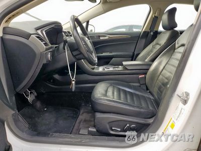 Zdjęcie 7 z 13 samochodu: 2017 FORD FUSION SE HYBRID VIN:3FA6P0LU0HR408973 - miniatura