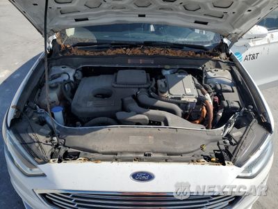Zdjęcie 11 z 12 samochodu: 2018 FORD FUSION SE HYBRID VIN:3FA6P0LU2JR281889 - miniatura