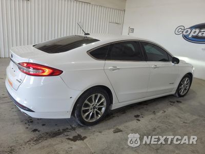 Trzecie zdjęcie samochodu z tyłu: 2017 FORD FUSION SE HYBRID VIN:3FA6P0LU7HR409506 - miniatura