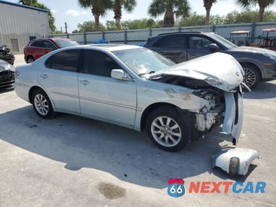 Czwarte zdjęcie samochodu z boku: 2002 LEXUS ES 300 VIN:JTHBF30G920036020 - miniatura