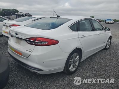 Trzecie zdjęcie samochodu z tyłu: 2018 FORD FUSION SE HYBRID VIN:3FA6P0LU1JR172095 - miniatura