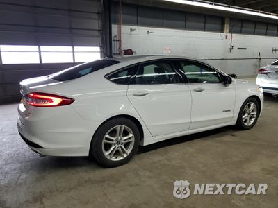 Trzecie zdjęcie samochodu z tyłu: 2018 FORD FUSION SE HYBRID VIN:3FA6P0LU7JR129851 - miniatura