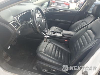 Zdjęcie 7 z 15 samochodu: 2017 FORD FUSION SE HYBRID VIN:3FA6P0LUXHR409239 - miniatura