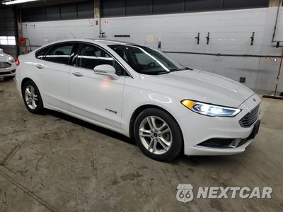 Czwarte zdjęcie samochodu z boku: 2018 FORD FUSION SE HYBRID VIN:3FA6P0LU8JR129860 - miniatura
