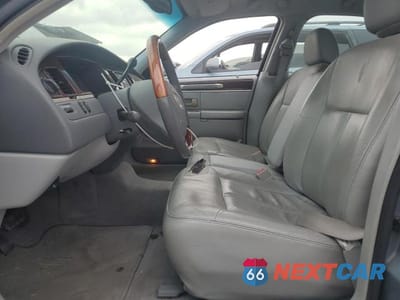 Zdjęcie 7 z 12 samochodu: 2004 LINCOLN TOWN CAR ULTIMATE VIN:1LNHM83W74Y648282 - miniatura