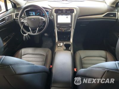 Zdjęcie 8 z 12 samochodu: 2018 FORD FUSION SE HYBRID VIN:3FA6P0LU2JR178455 - miniatura