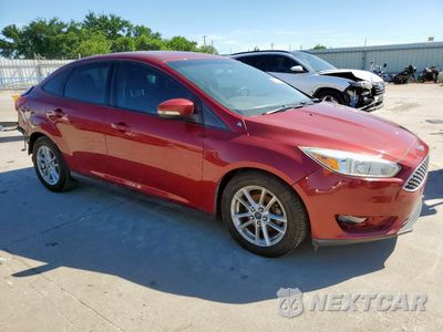 Czwarte zdjęcie samochodu z boku: 2017 FORD FOCUS SE VIN:1FADP3F25HL204901 - miniatura