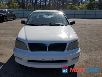 Piąte zdjęcie samochodu w środku: 2003 MITSUBISHI LANCER ES VIN:JA3AJ26E83U076335 - miniatura