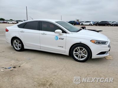 Czwarte zdjęcie samochodu z boku: 2018 FORD FUSION SE HYBRID VIN:3FA6P0LU4JR171880 - miniatura
