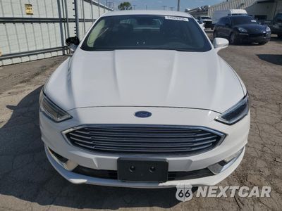 Piąte zdjęcie samochodu w środku: 2017 FORD FUSION SE HYBRID VIN:3FA6P0LUXHR409404 - miniatura