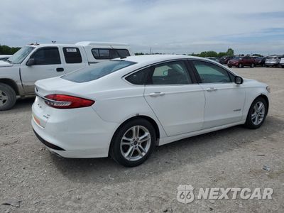Trzecie zdjęcie samochodu z tyłu: 2018 FORD FUSION SE HYBRID VIN:3FA6P0LU5JR172035 - miniatura