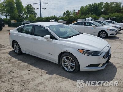 Czwarte zdjęcie samochodu z boku: 2018 FORD FUSION SE HYBRID VIN:3FA6P0LUXJR118861 - miniatura