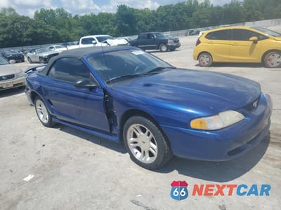 Czwarte zdjęcie samochodu z boku: 1996 FORD MUSTANG GT VIN:1FALP45X9TF225322 - miniatura