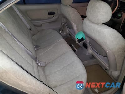 Zdjęcie 10 z 12 samochodu: 2002 HYUNDAI ELANTRA GLS VIN:KMHDN45D72U270727 - miniatura