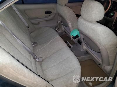 Zdjęcie 10 z 12 samochodu: 2002 HYUNDAI ELANTRA GLS VIN:KMHDN45D72U270727 - miniatura
