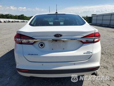 Zdjęcie 6 z 12 samochodu: 2017 FORD FUSION SE HYBRID VIN:3FA6P0LU8HR359537 - miniatura