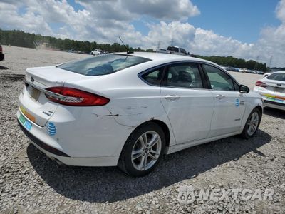 Trzecie zdjęcie samochodu z tyłu: 2018 FORD FUSION SE HYBRID VIN:3FA6P0LU8JR172093 - miniatura
