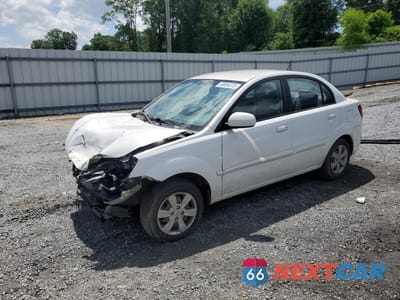 2010 KIA RIO LX KNADH4A31A6645505 - główne zdjęcie licytacji z USA - miniatura