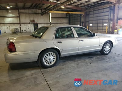 Trzecie zdjęcie samochodu z tyłu: 2010 MERCURY GRAND MARQUIS LS VIN:2MEBM7FV9AX622090 - miniatura