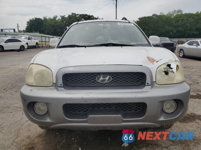 Piąte zdjęcie samochodu w środku: 2002 HYUNDAI SANTA FE GLS VIN:KM8SC13D92U292632 - miniatura