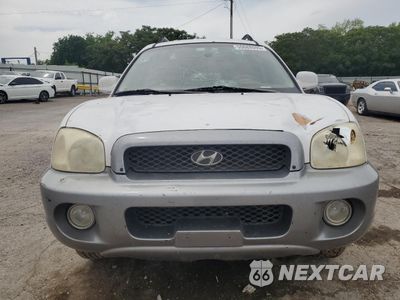 Piąte zdjęcie samochodu w środku: 2002 HYUNDAI SANTA FE GLS VIN:KM8SC13D92U292632 - miniatura