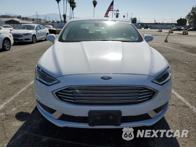 Piąte zdjęcie samochodu w środku: 2018 FORD FUSION SE HYBRID VIN:3FA6P0LU0JR118870 - miniatura