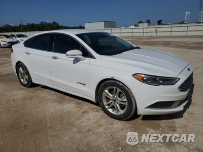 Czwarte zdjęcie samochodu z boku: 2018 FORD FUSION SE HYBRID VIN:3FA6P0LU7JR171694 - miniatura