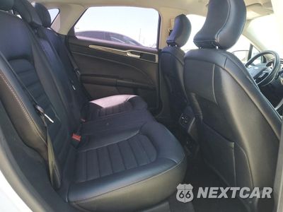 Zdjęcie 10 z 12 samochodu: 2018 FORD FUSION SE HYBRID VIN:3FA6P0LU5JR281868 - miniatura