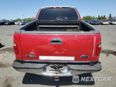 Zdjęcie 6 z 12 samochodu: 2001 FORD F150 SUPERCREW VIN:1FTRW08L91KF46743 - miniatura