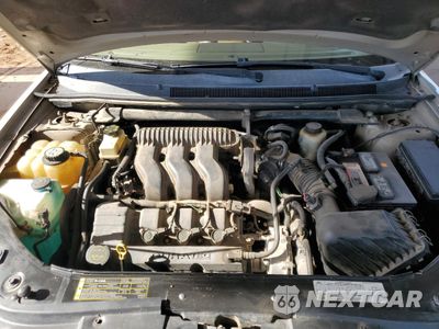 Zdjęcie 11 z 14 samochodu: 2006 MERCURY MONTEGO PREMIER VIN:1MEFM42136G601204 - miniatura
