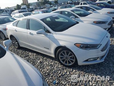Czwarte zdjęcie samochodu z boku: 2017 FORD FUSION SE HYBRID VIN:3FA6P0LU2HR410143 - miniatura