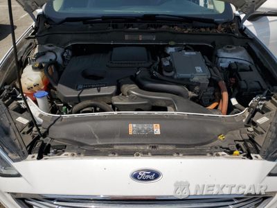 Zdjęcie 11 z 13 samochodu: 2018 FORD FUSION SE HYBRID VIN:3FA6P0LU4JR172110 - miniatura