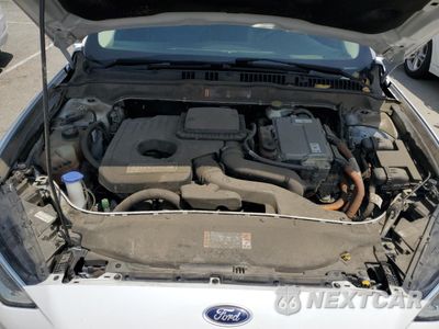 Zdjęcie 11 z 12 samochodu: 2017 FORD FUSION SE HYBRID VIN:3FA6P0LU7HR409764 - miniatura