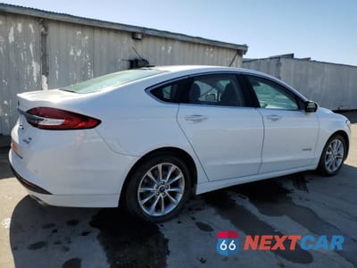 Trzecie zdjęcie samochodu z tyłu: 2017 FORD FUSION SE HYBRID VIN:3FA6P0LU7HR409523 - miniatura