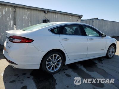Trzecie zdjęcie samochodu z tyłu: 2017 FORD FUSION SE HYBRID VIN:3FA6P0LU7HR409523 - miniatura